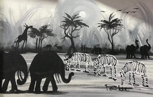 Zebras and elephants cross paths
