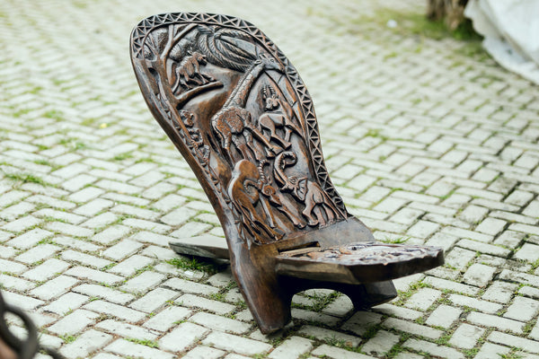 Chair-Ornate folding Chair, hand-carved of dark colour drum wood, Ghana, West Africa Large= 112 cm X 53 cm