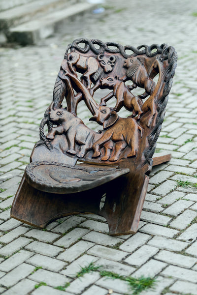 Chair-Ornate folding Chair, hand-carved of dark colour drum wood, Ghana, West Africa Small= 87 cm X 38 cm