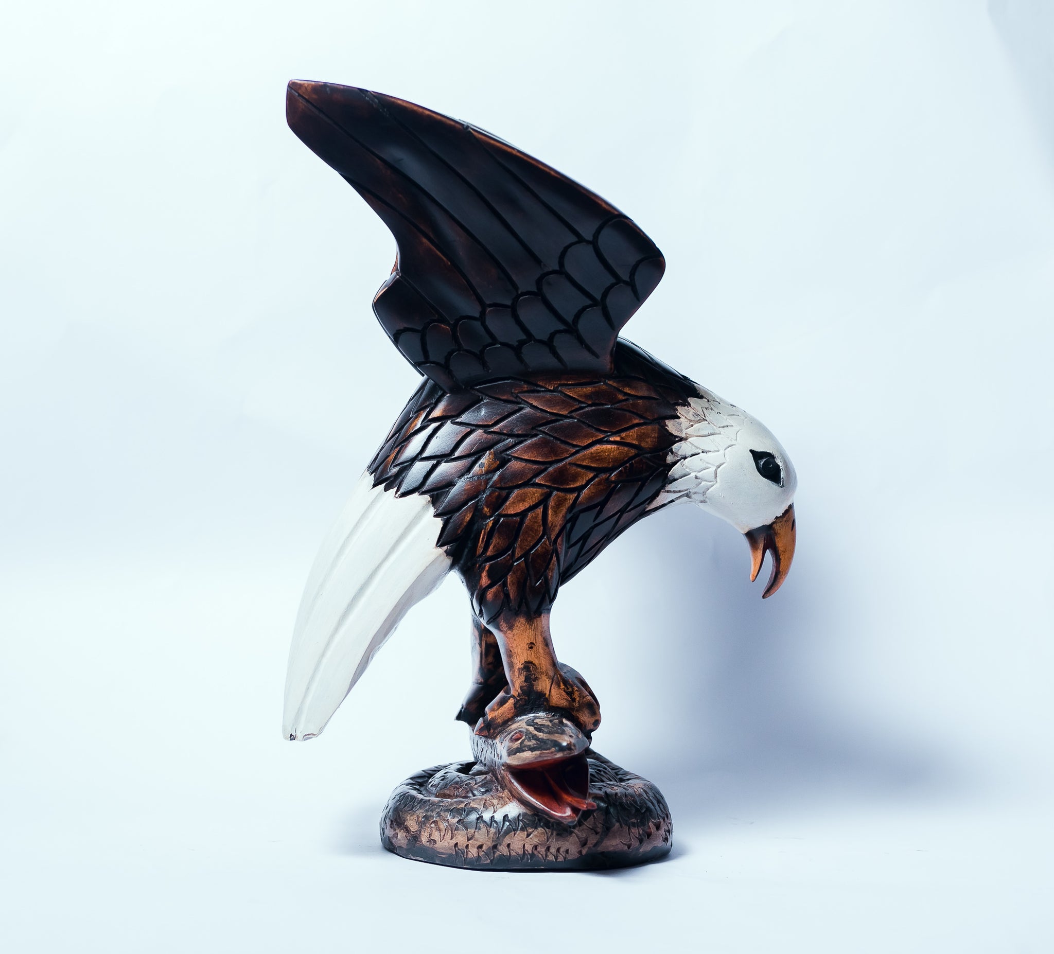 African Wood Sculpture-Eagle standing on coiled Snake 