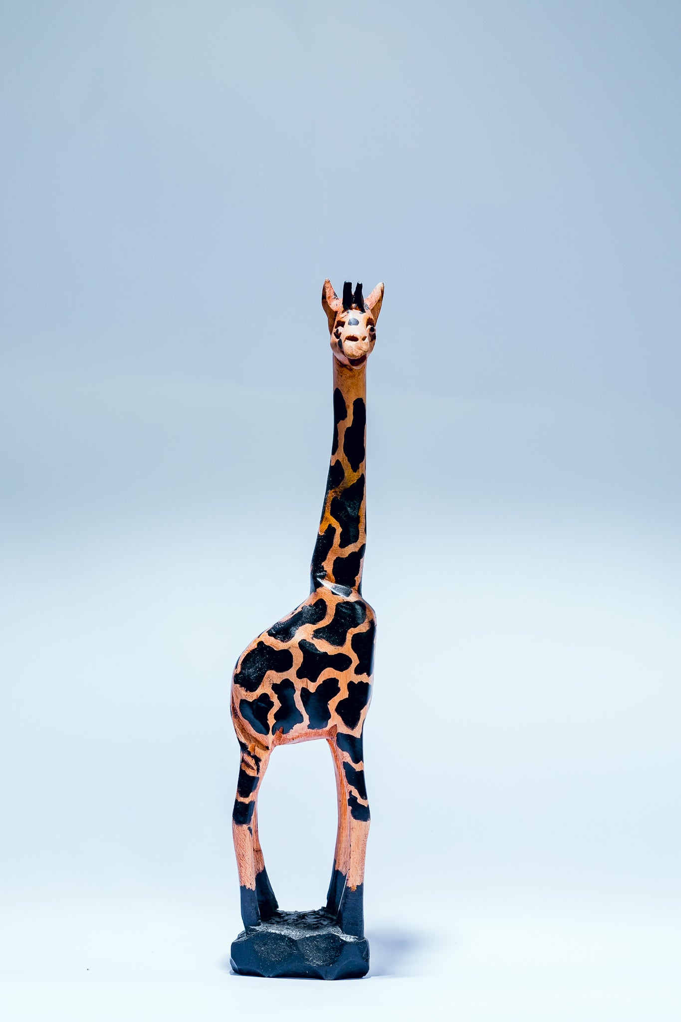 Giraffe with blue Feet, hand carved, osese wood, Ghana, West Africa 32 cm X 7 cm