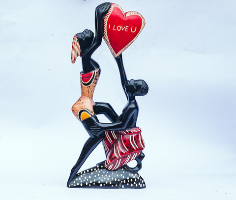 African Wood Sculpture-Man and Woman holding a Heart "I Love U", hand-carved of white wood, Ghana, West Africa 45 cm X 20 cm