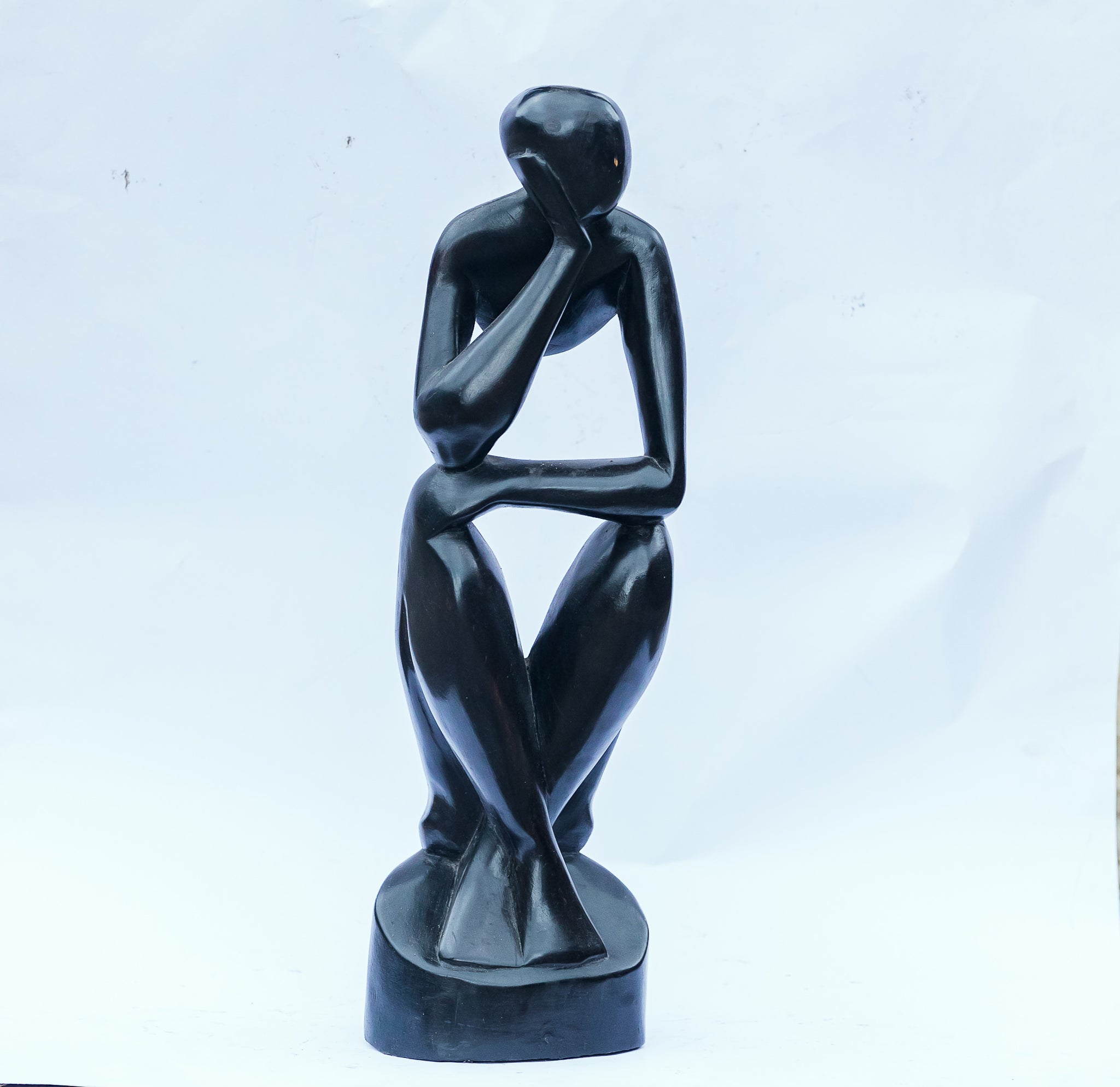 African Wood Sculpture-Man sitting cross-legged Hand on Chin thinking, hand-carved of white wood, Ghana, West Africa 51 cm X 15 cm