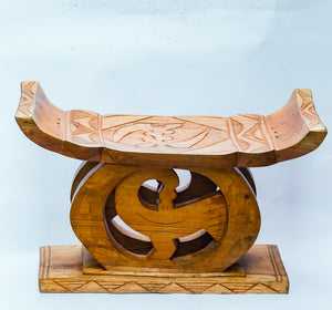 Golden Stool-The Chief Stool is fit for a King or Queen, Adinkra Symbol of 'Sankofa Bird ("Go back and get it" in Twi), hand-carved of brown wood, Ghana, West Africa 59 cm X 38 cm