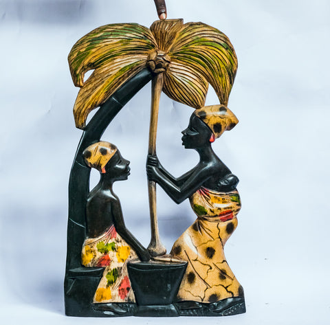 African Wood Sculpture-Two Women (one with baby ) pounding Cassava under a Palm Tree, hand-carved of white wood, Ghana, West Africa 25 cm X 12 cm